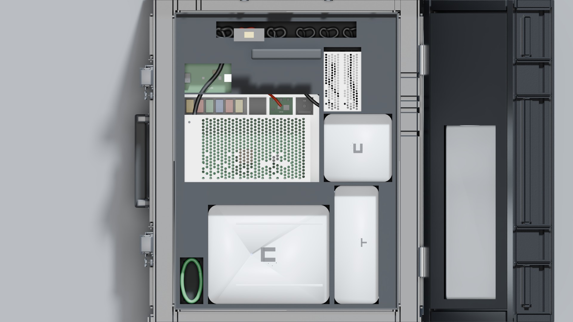Overhead of the open Event pack: filled Mini array in the milled lid pocket, UX7 U on top, Ultra, U7 Outdoor, LRS, and coils.